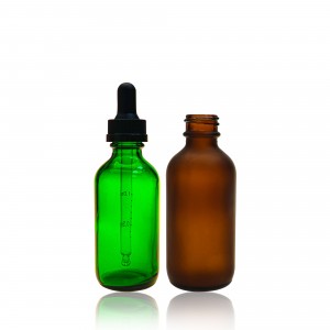 Frosted green transparent glass dropping bottle of essential oil