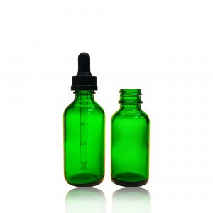 Frosted green transparent glass dropping bottle of essential oil